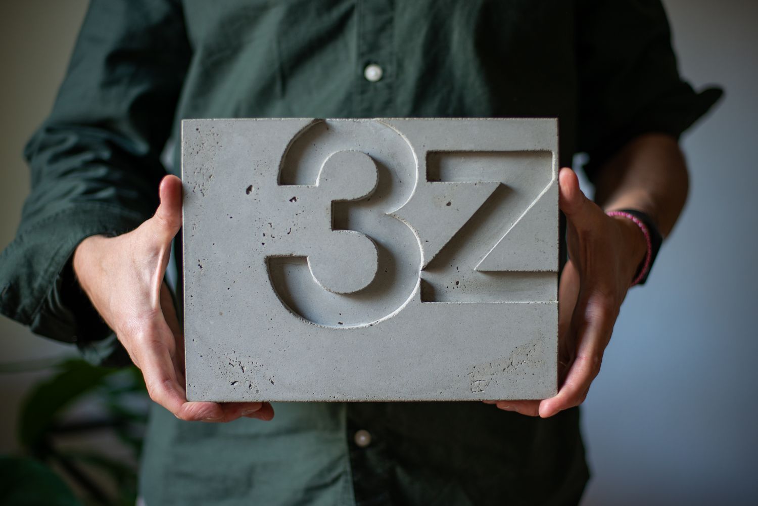 brutalist house number in concrete. custom door sign