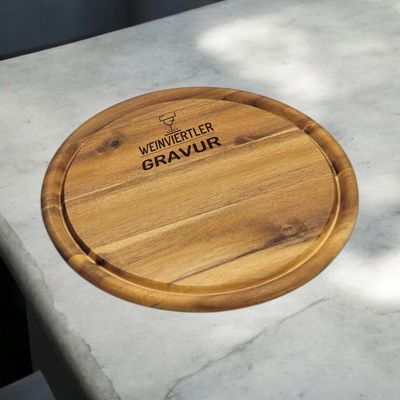 Schneidebrett rund mit Saftrille und Personalisierung mit deinem Logo aus Akazienholz, Durchmesser 25cm, Staffelpreise beachten!