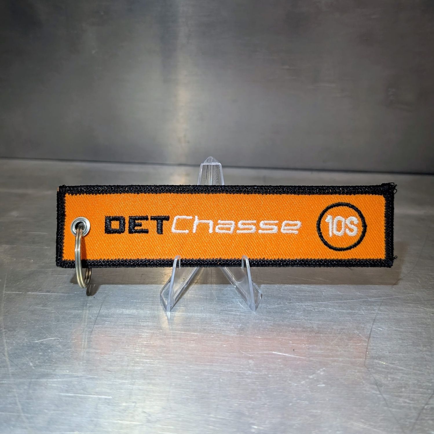 Porte cles Flamme DET Chasse Orange