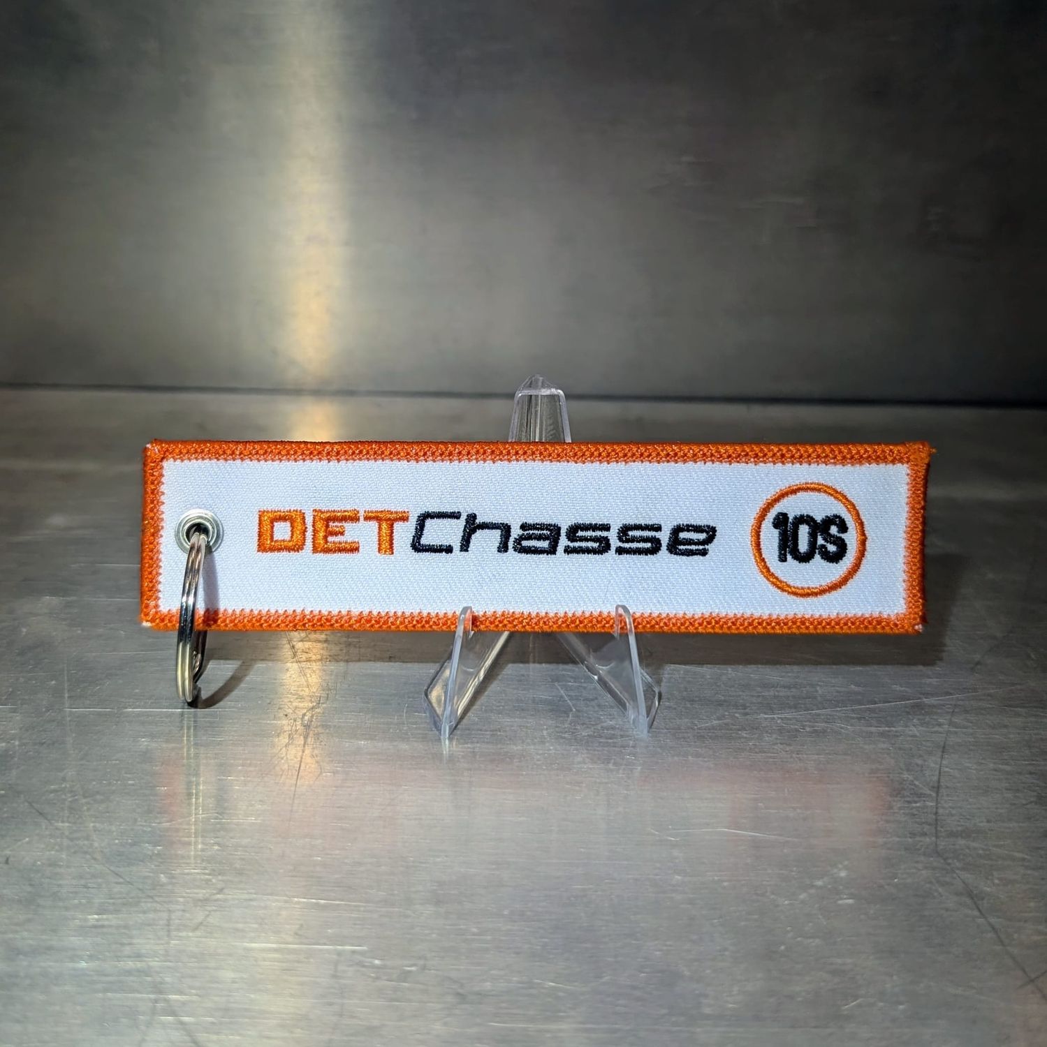 Porte cles Flamme DET Chasse Blanche