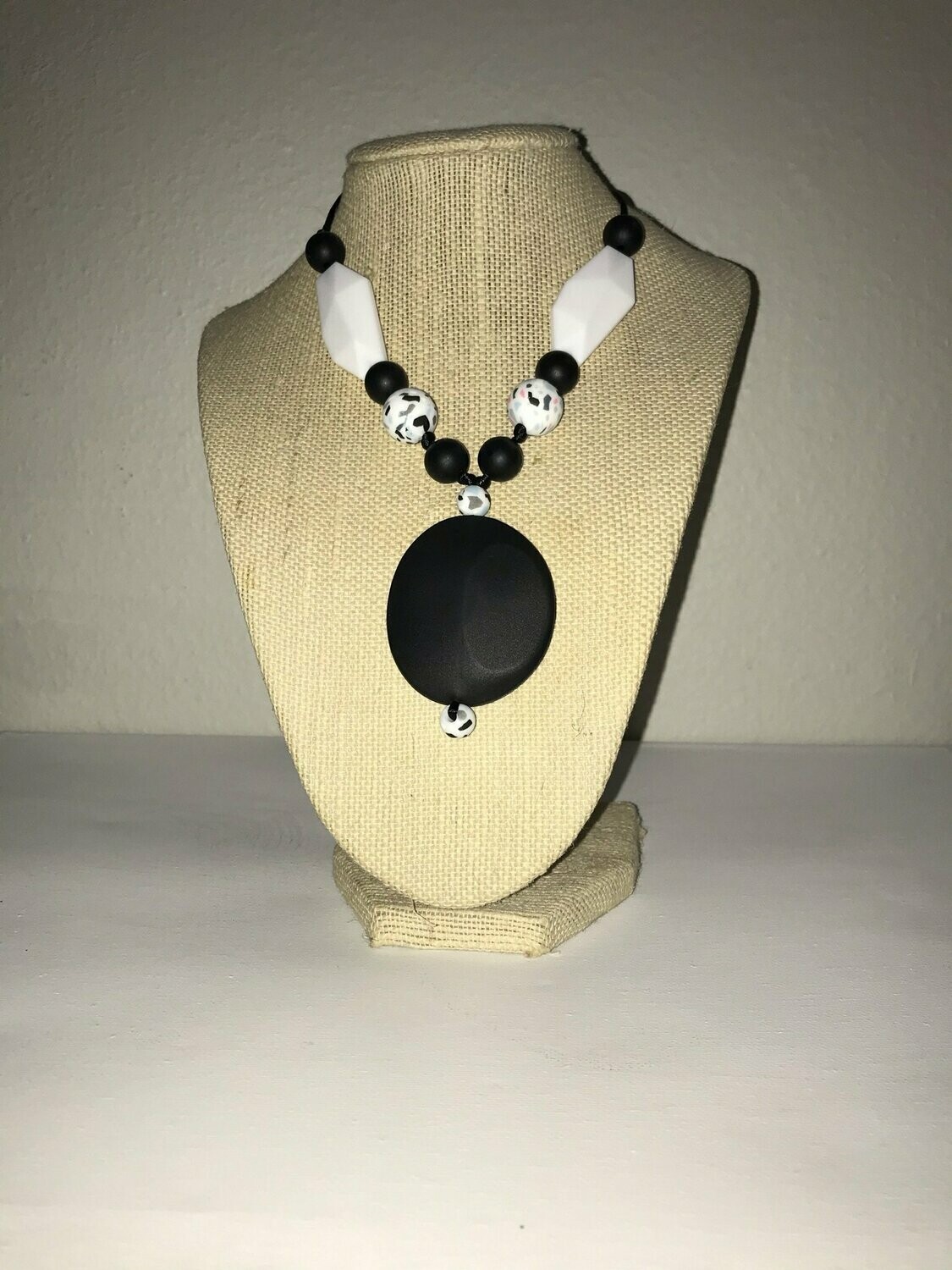Large oval pendant single strand nursing necklace