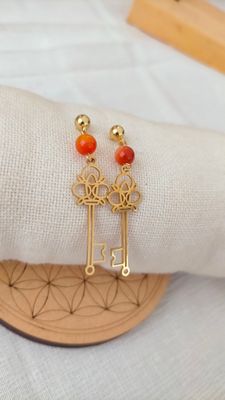 Boucle d'oreille Clef