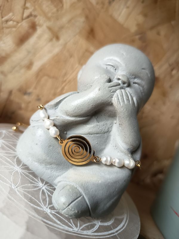 Symbolique tourbillon Perle de culture