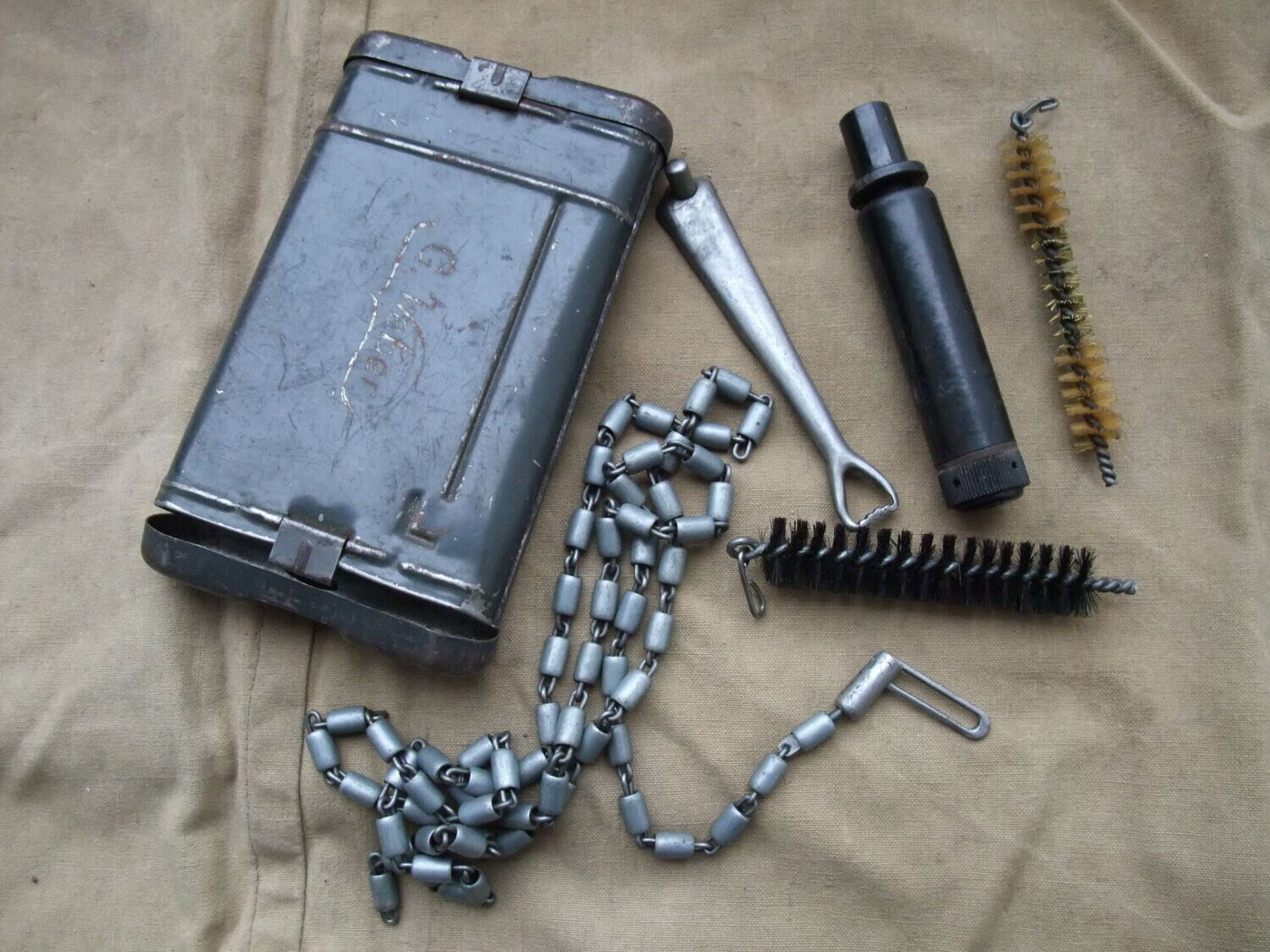 Wehrmacht: Reinigungsgerät RG34 für K98, mit Hersteller cmr 1942, WaA, Originallack.
