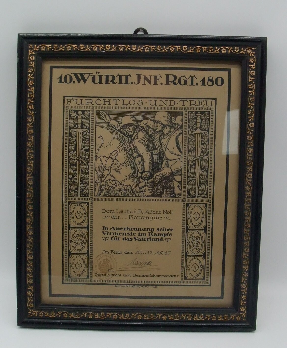 Württemberg: Anerkennungsurkunde für einen Leutnant im 10. Württembergischen Infanterie-Regiment Nr. 180, mit Originalunterschrift Regimentskommandeur Alfred Vischer 1917, alt gerahmt, unter Glas.