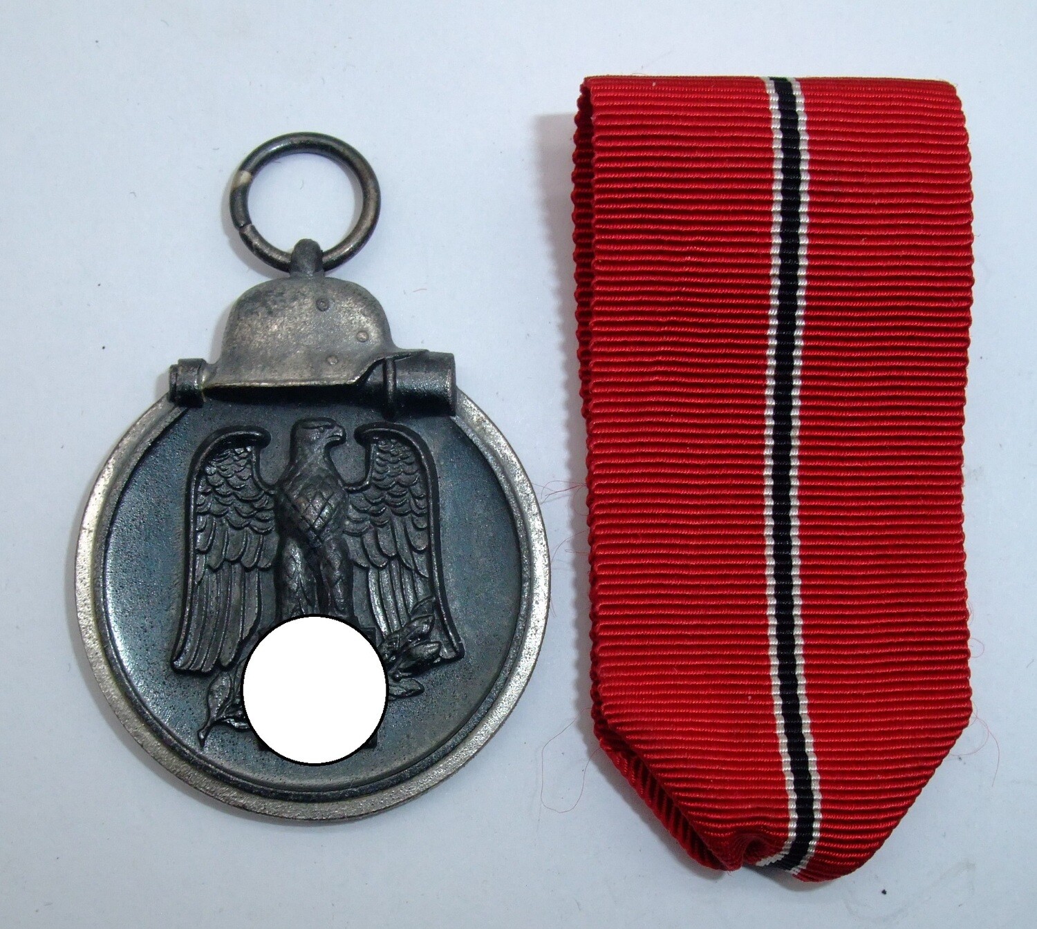 Wehrmacht: Medaille Winterschlacht im Osten, Ostmedaille, mit Hersteller 88 für die Firma Werner Redo, Saarlautern.