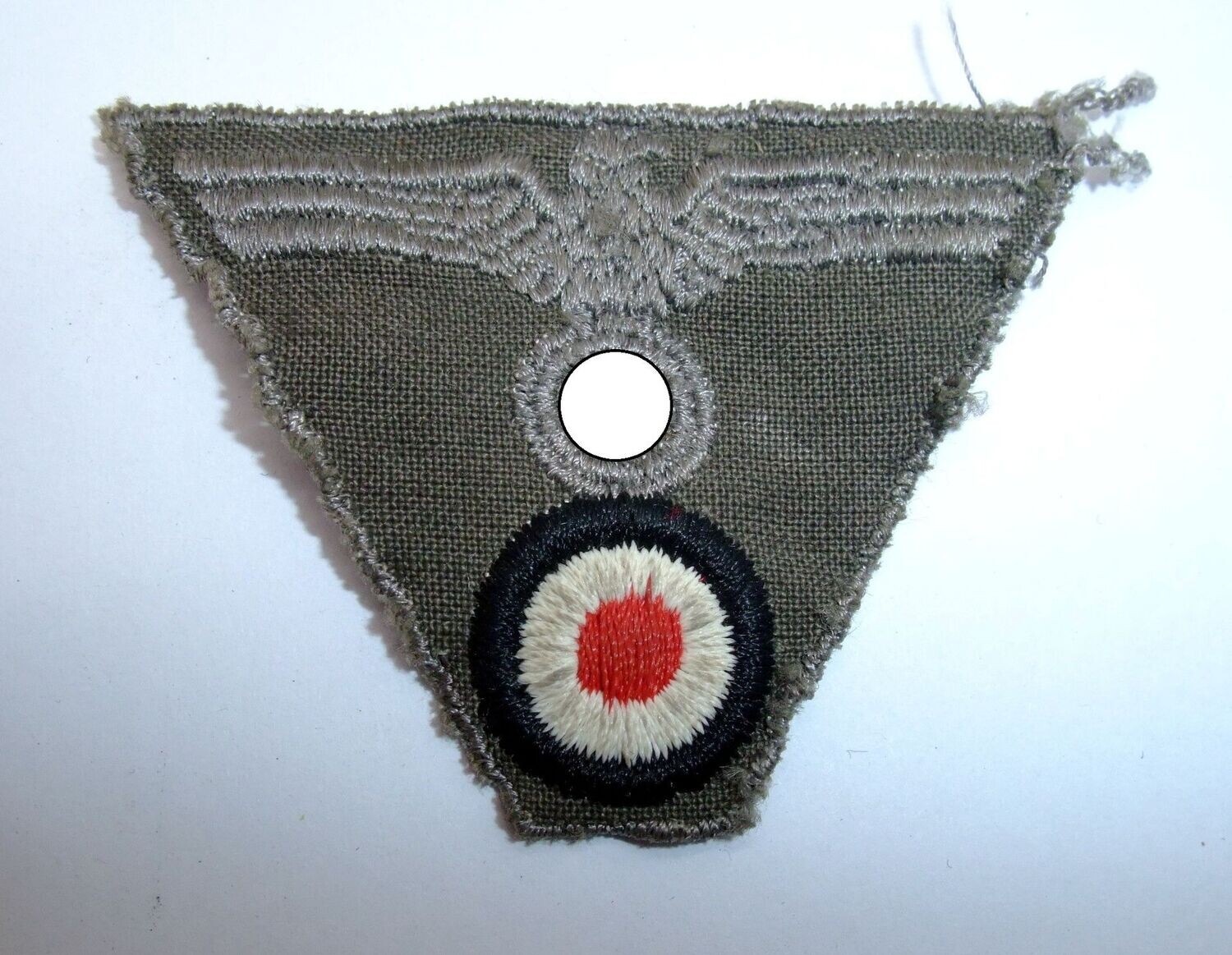 Wehrmacht: Mützentrapez, Adler & Kokarde für die Feldmütze, maschinengestickt.