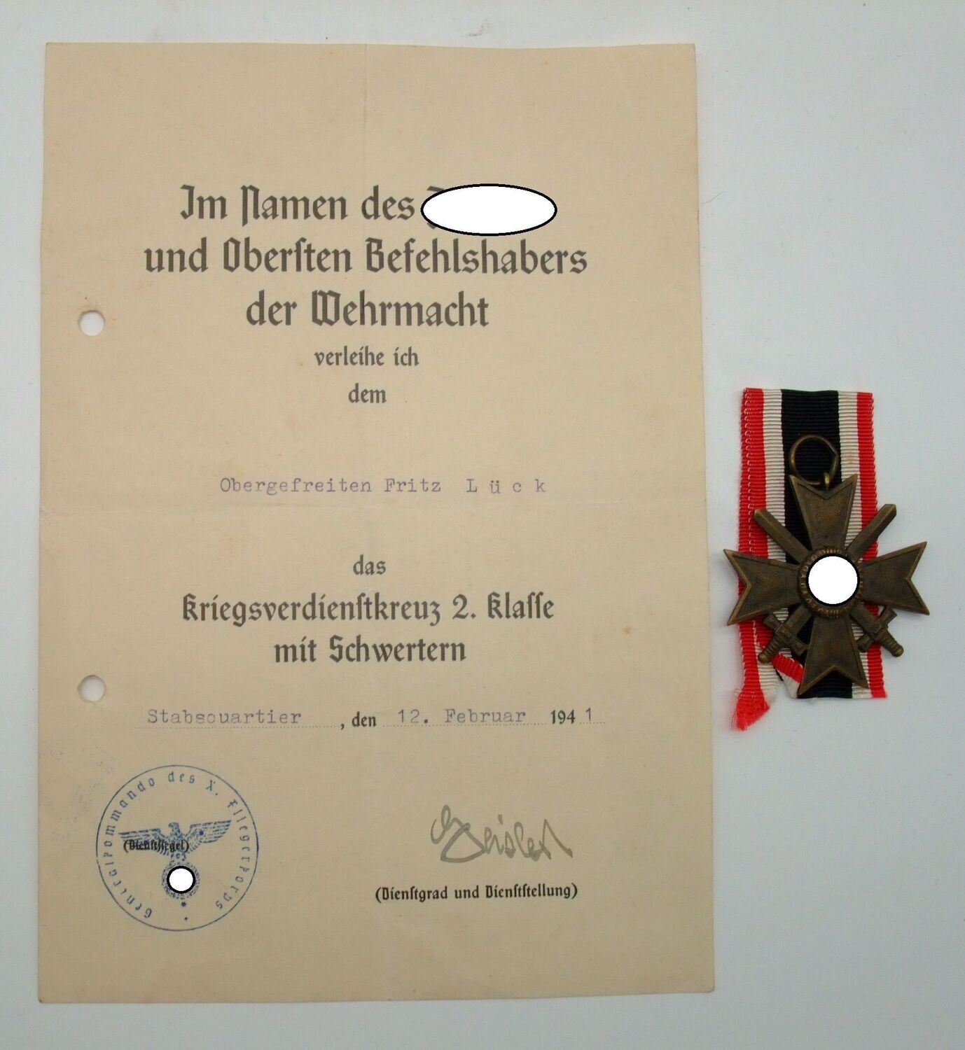 Luftwaffe: Kriegsverdienstkreuz KVK 2. Klasse mit Schwertern, mit Urkunde vom 12. Februar 1941, Originalunterschrift  General der Flieger Hans
Geisler (Ritterkreuzträger).