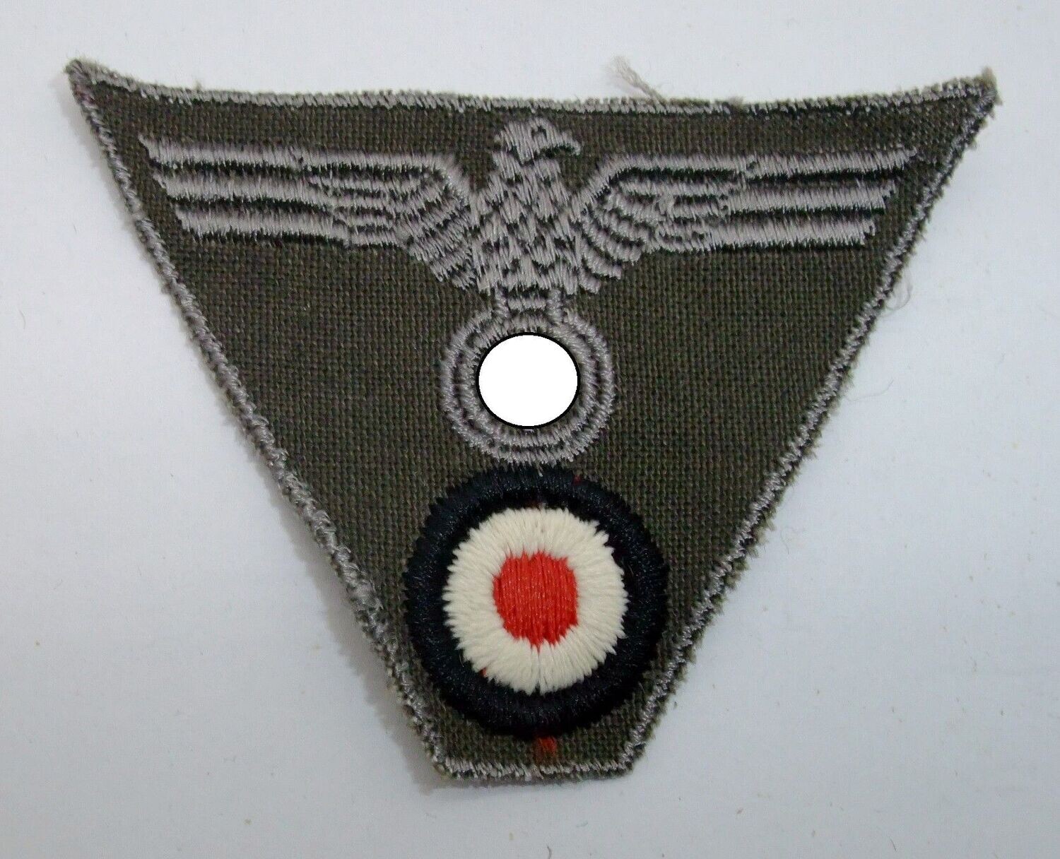 Wehrmacht: Mützentrapez, Adler & Kokarde für die Feldmütze, maschinengestickt.