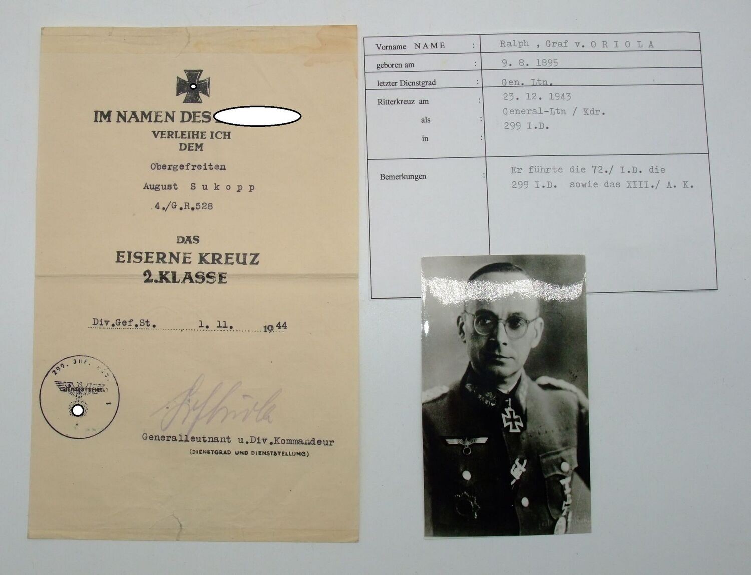 Wehrmacht: Urkunde zum Eisernen Kreuz 2. Klasse für einen Obergefreiten im Grenadier-Regiment 528, 1944, OU Generalleutnant Ralph Graf von Oriola (RK, DKiG.).