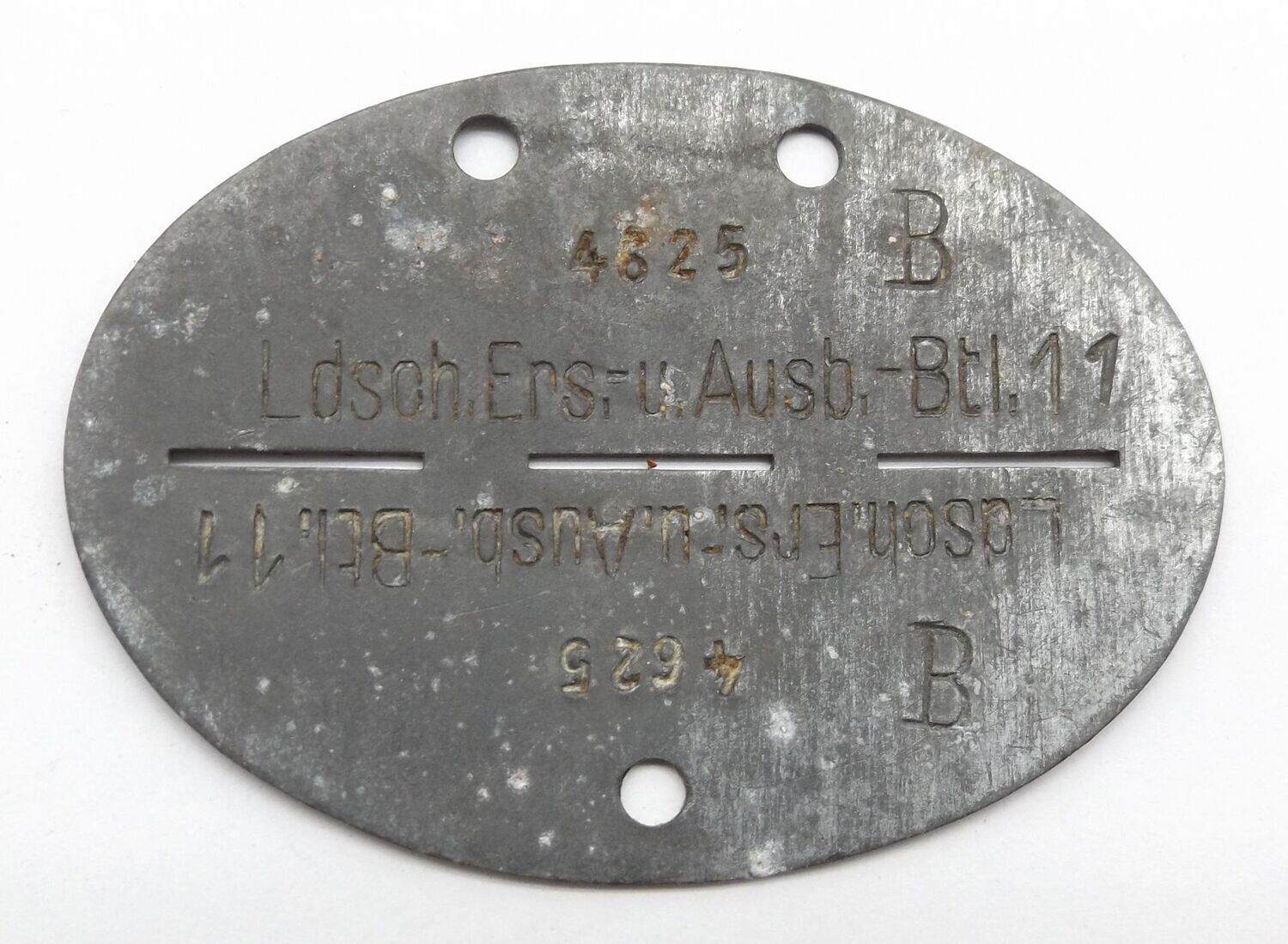 Wehrmacht: Erkennungsmarke Landesschützen-Ersatz- und Ausbildungs-Bataillon 11, Hildesheim.