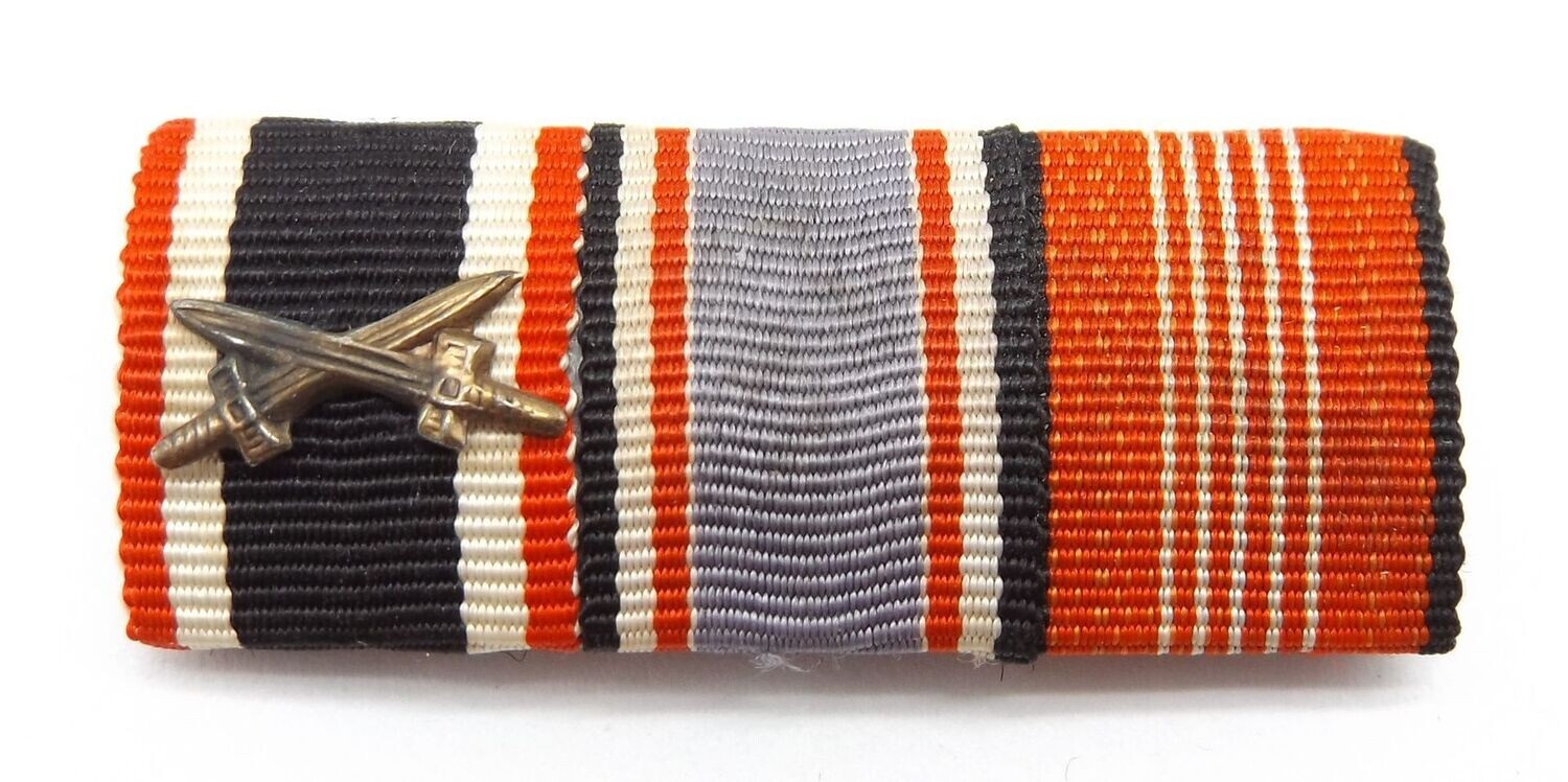 3. Reich: Feldspange mit KVK, Luftschutzehrenzeichen, Olympia-Erinnerungsmedaille 1936.