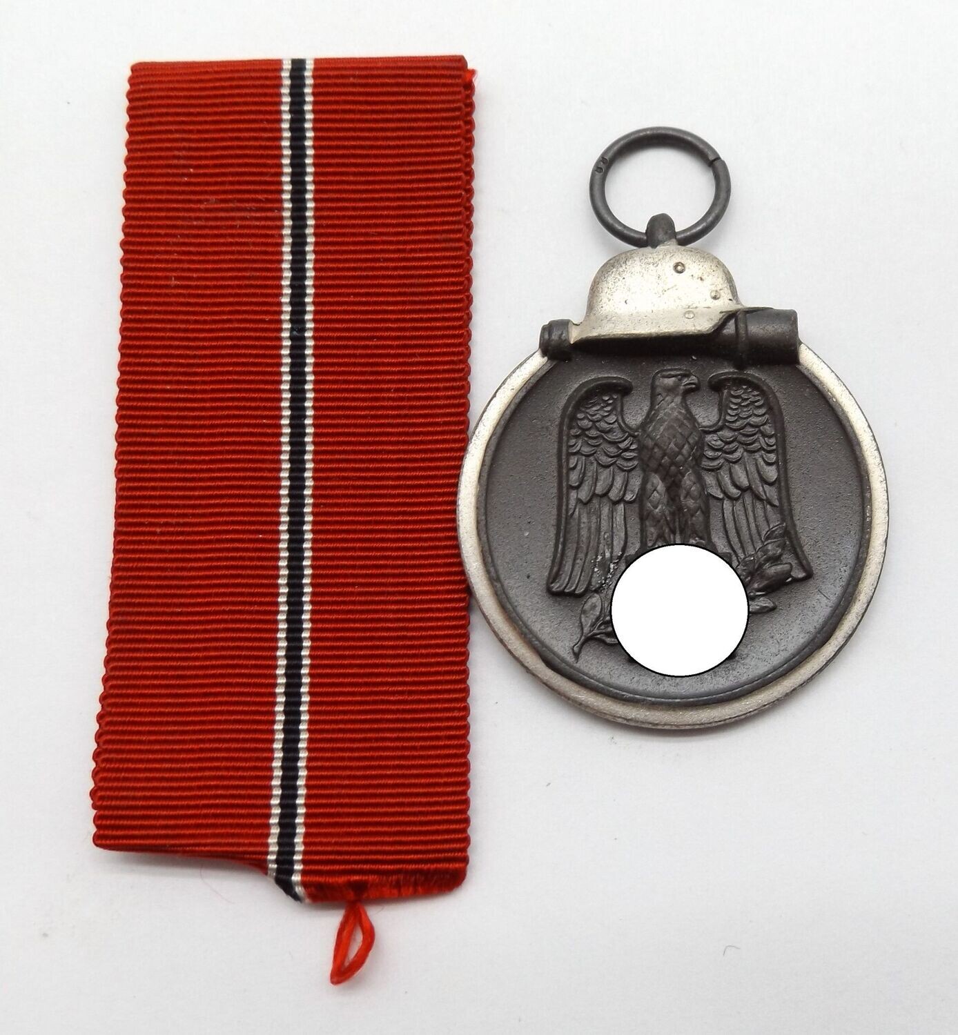 Wehrmacht: Medaille Winterschlacht im Osten, Ostmedaille, mit Hersteller 88 für die Firma Werner Redo, Saarlautern.