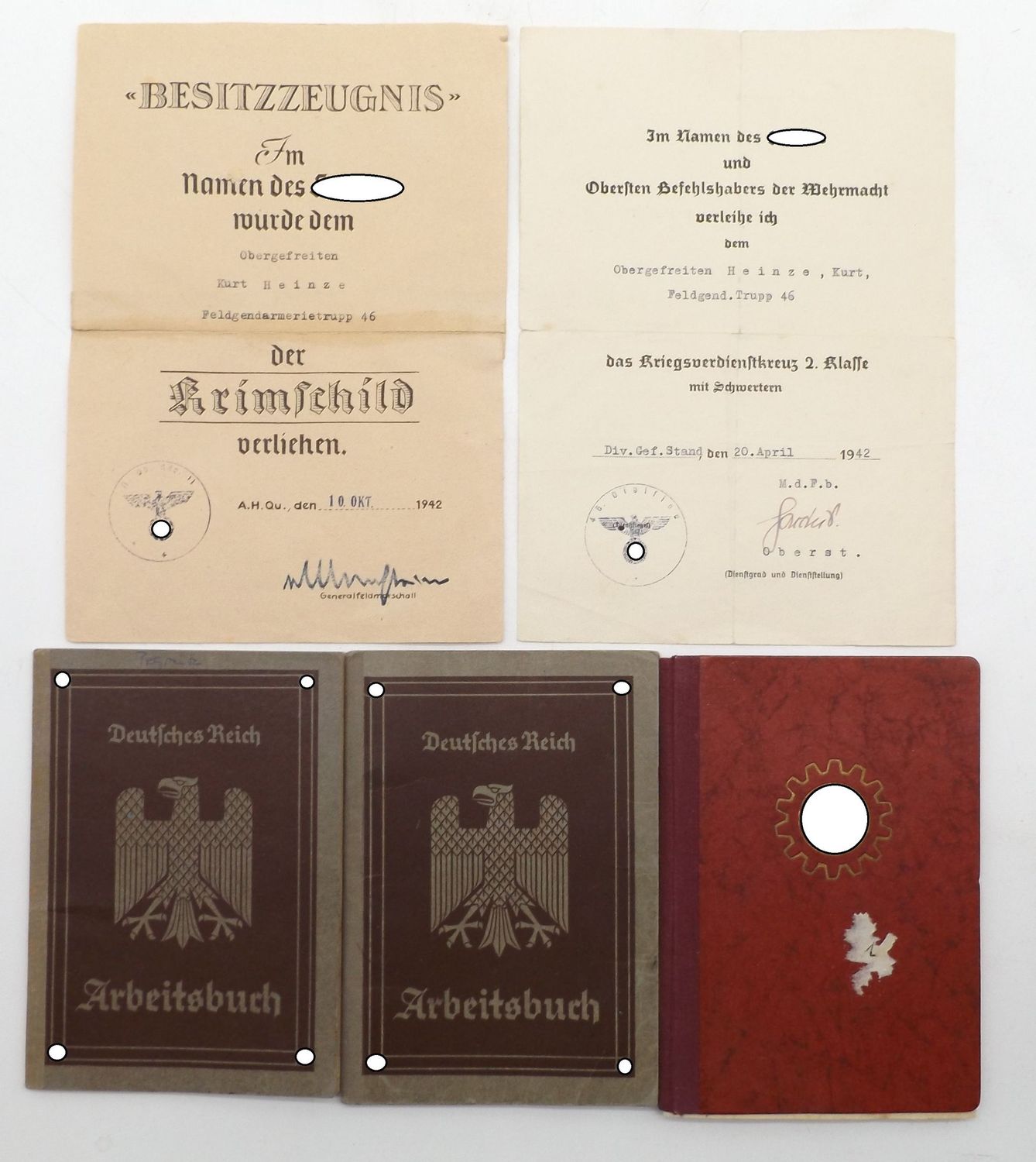 Wehrmacht: Dokumentennachlass eines Obergefreiten im Feldgendarmerie Trupp 46, Urkunde zum Krimschild, Urkunde zum KVK 2. Klasse, OU Ernst Haccius (RK, DKiG), dazu weitere Dokumente.