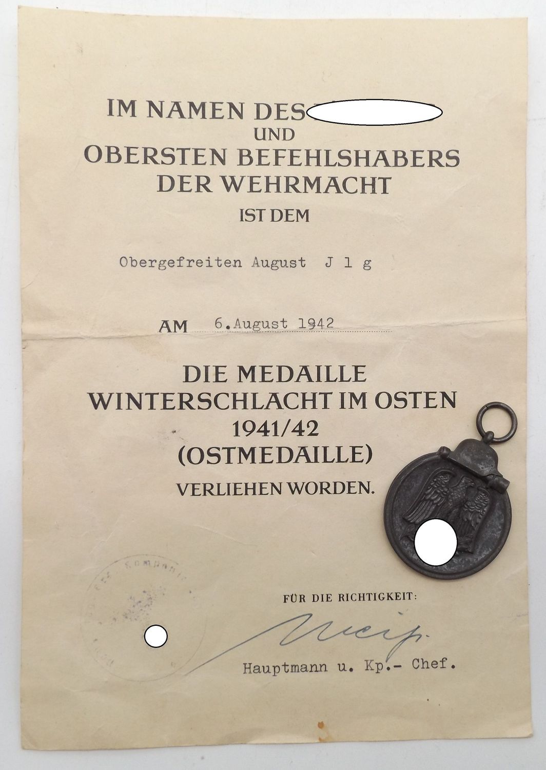 Wehrmacht: Urkunde zur Medaille Winterschlacht im Osten, Ostmedaille für einen Obergefreiten der Panzerjäger-Ersatz-Kompanie 267, 6.8.1942, dazu die Ostmedaille.