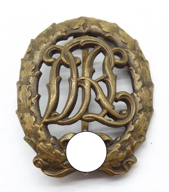 Reichssportabzeichen DRL in Bronze, mit Hersteller Wernstein Jena – D.R.G.M. 35269. Reichssportabzeichen DRL in Bronze, mit Hersteller Wernstein Jena – D.R.G.M. 35269.