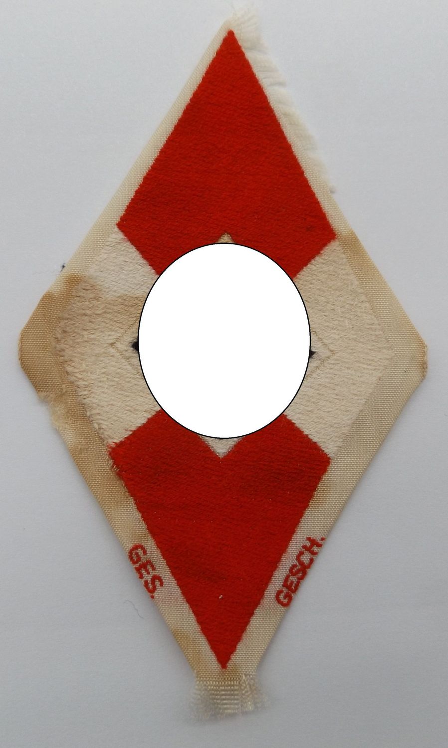 HJ / BDM: Raute, Stoffabzeichen, konfektioniert, gemarkt GES. GESCH., Maße der Raute ca. 9,5 x 5,5 cm.