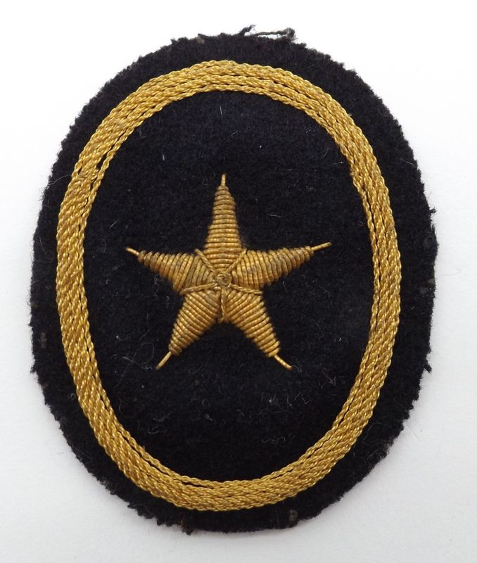 Kriegsmarine: Ärmelabzeichen für Kadetten der seemännischen Laufbahn, rückseitig mit Herstellerstempel.