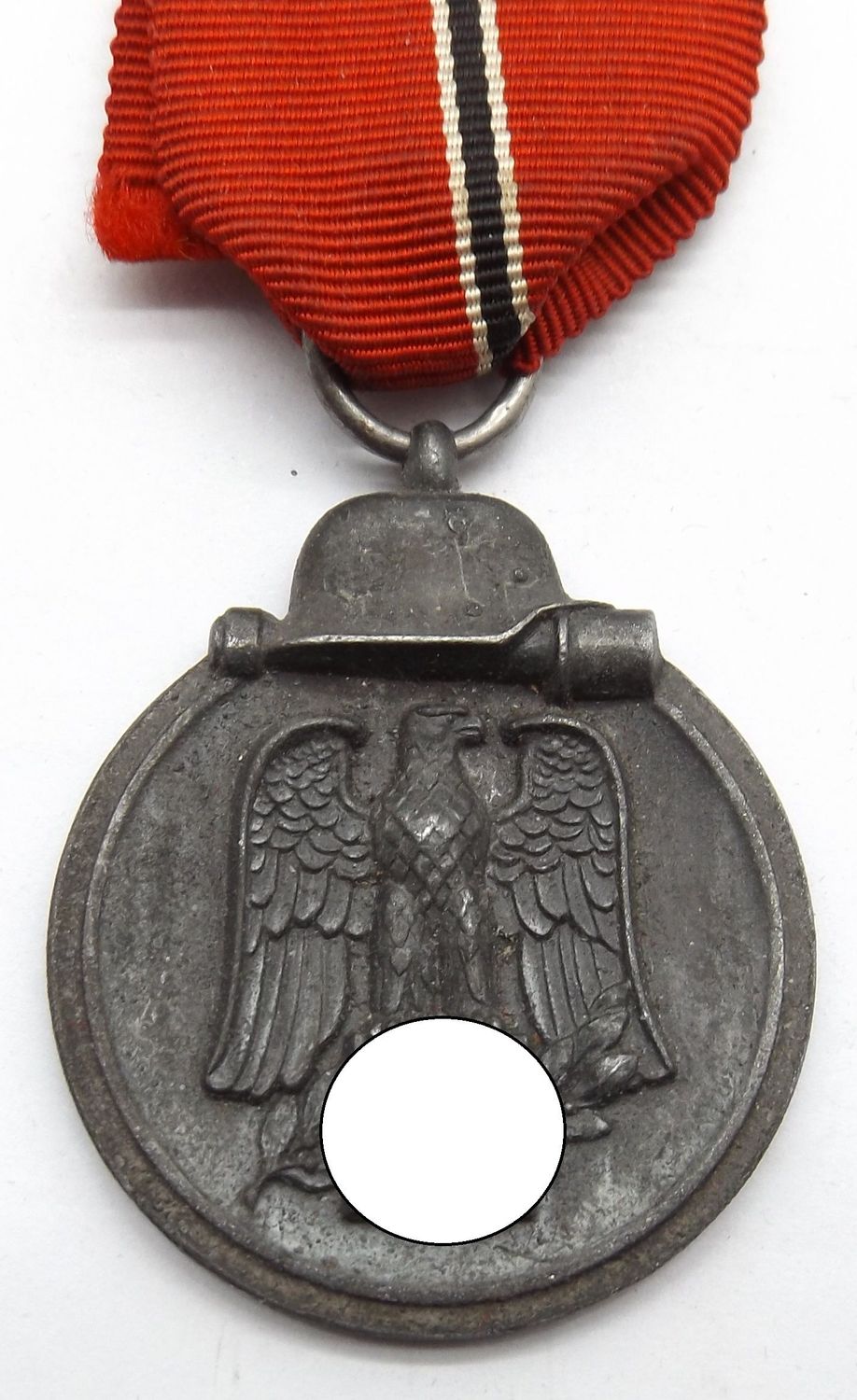 Wehrmacht: Medaille Winterschlacht im Osten, Ostmedaille, mit Hersteller 76 für die Firma Ernst L. Müller, Pforzheim. Selten! Wehrmacht: Medaille Winterschlacht im Osten, Ostmedaille, mit Hersteller 76 für die Firma Ernst L. Müller, Pforzheim. Selten!