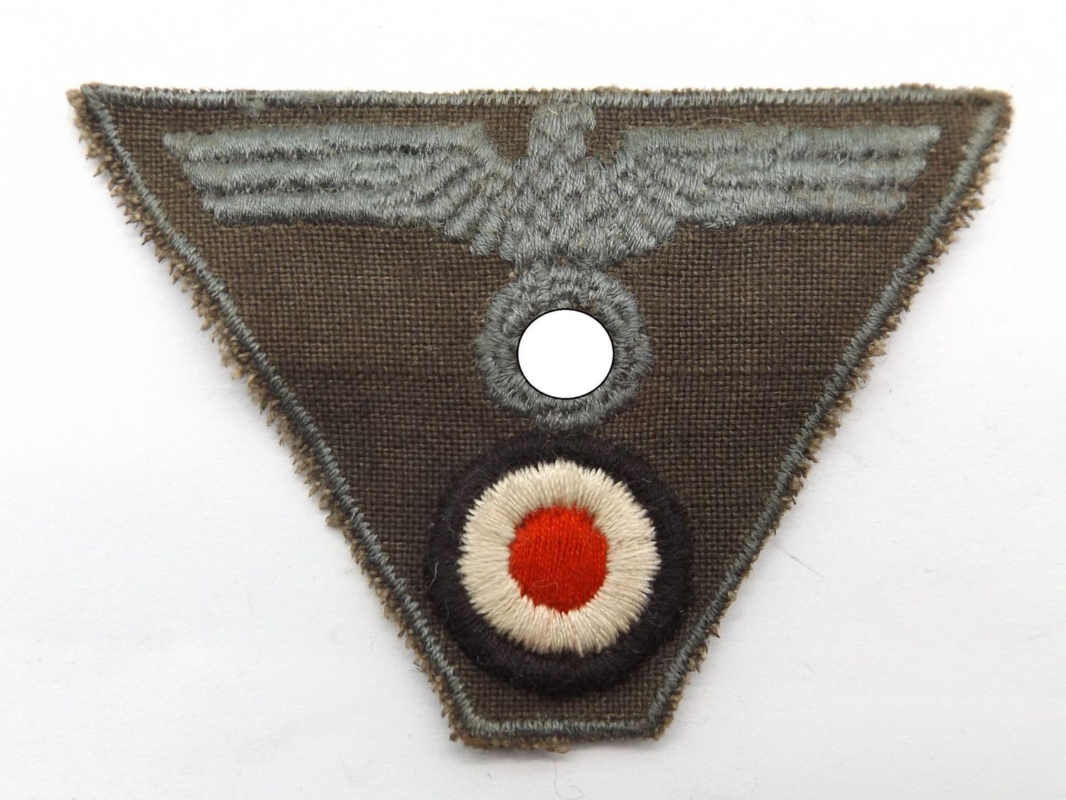 Wehrmacht: Mützentrapez, Adler & Kokarde für die Feldmütze, maschinengestickt.