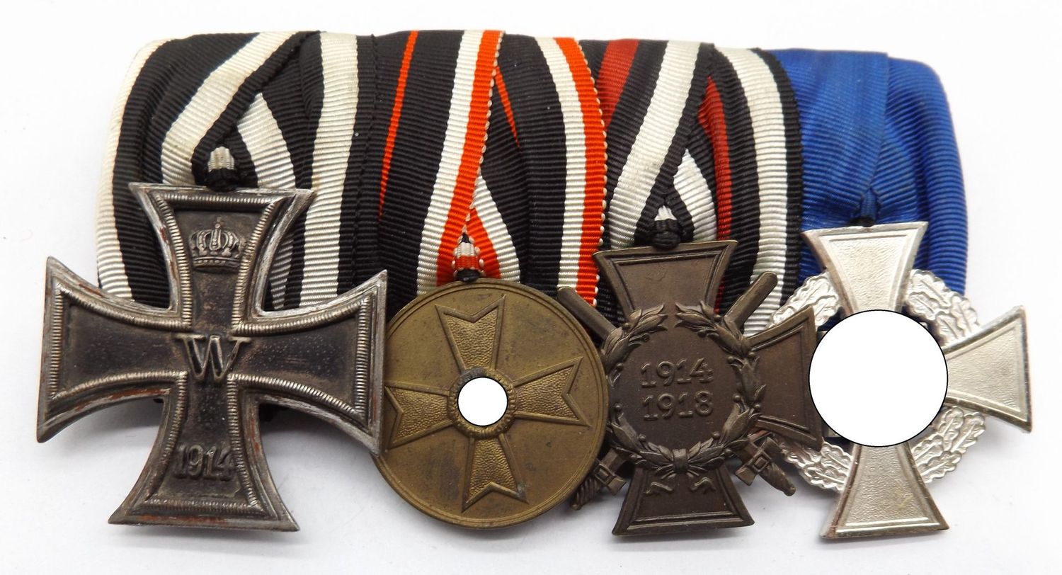 3. Reich: 4-er Ordensschnalle. EK2 1914, KVK-Medaille, FEK, Treudienst-Ehrenzeichen für 25 Jahre.