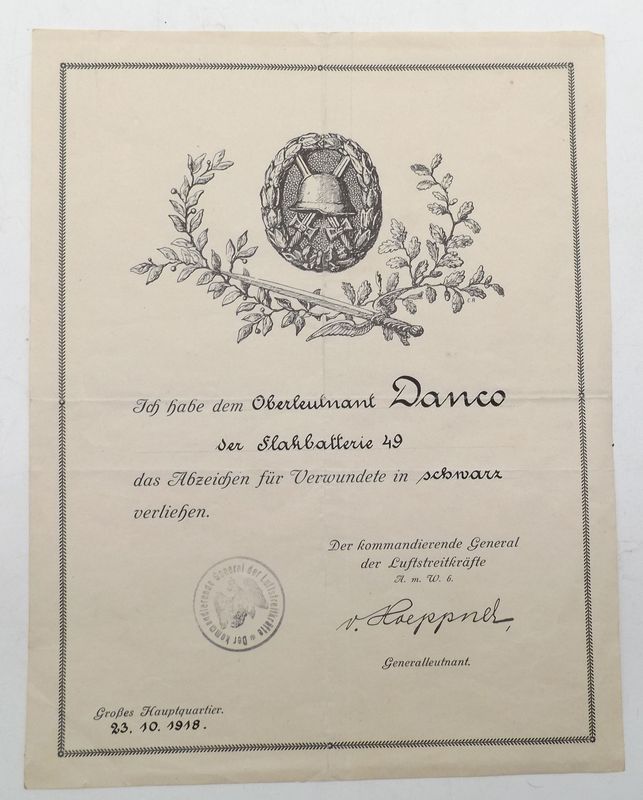 Deutsches Reich: Verleihungsurkunde zum Verwundetenabzeichen in Schwarz für einen Oberleutnant in der Flakbatterie 49, FU kommandierender General der Luftstreitkräfte, Großes Hauptquartier 23.10.1918.