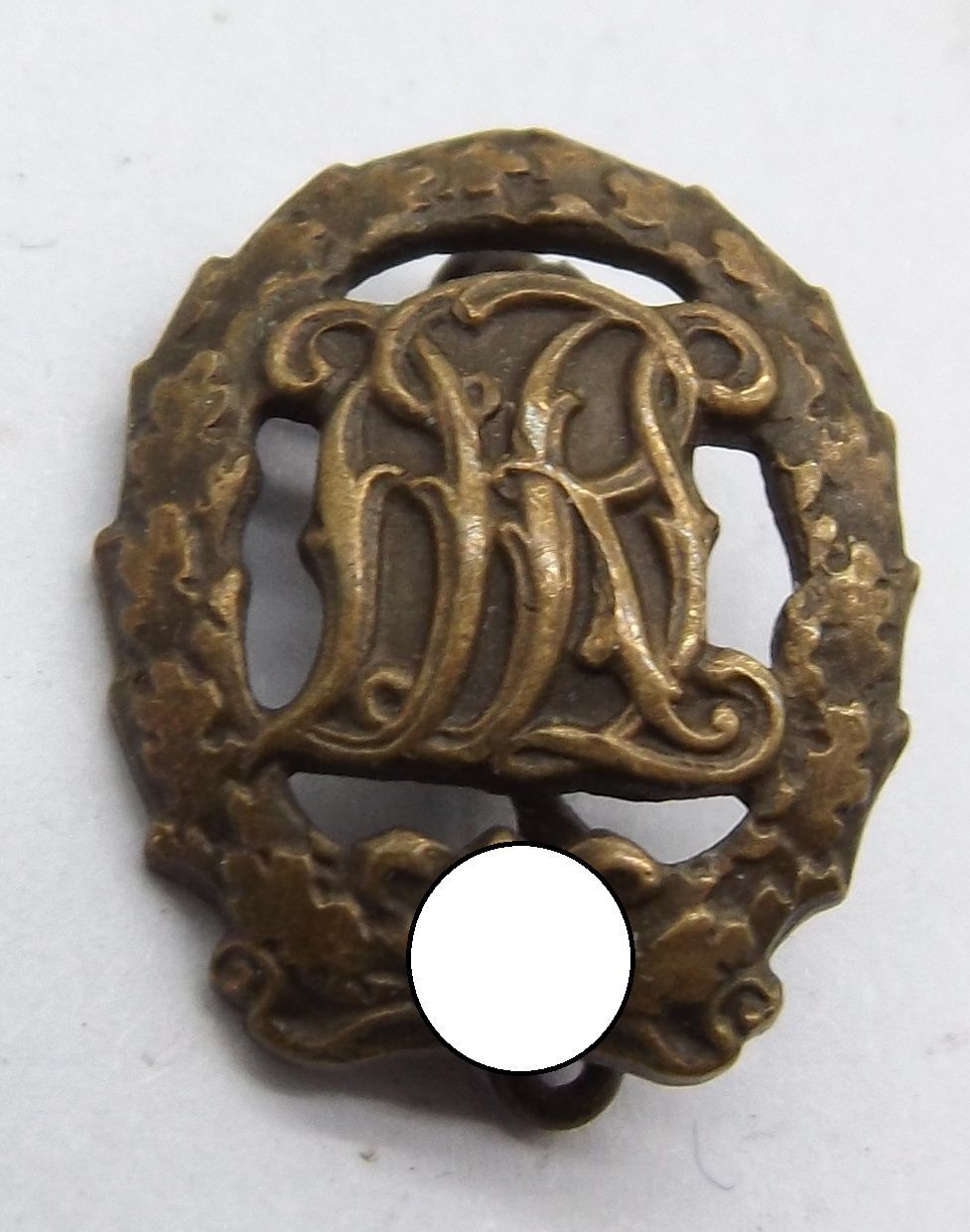 Deutsches Reich: DRL Sportabzeichen, Miniatur an Nadel, Maße ca. 17 x 14 mm.