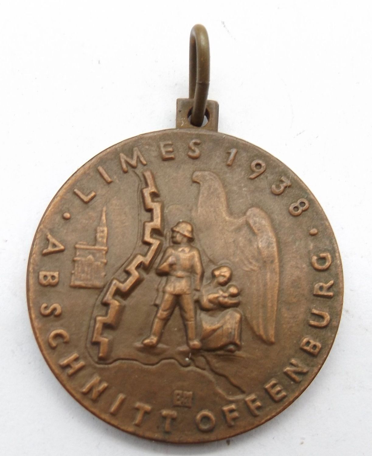 3. Reich: LIMES-WESTWALL-MEDAILLE 1938 ABSCHNITT OFFENBURG, Hauptunternehmer Grün u. Bilfinger A.G, Bronze, Durchmesser ca. 36mm. 3. Reich: LIMES-WESTWALL-MEDAILLE 1938 ABSCHNITT OFFENBURG, Hauptunternehmer Grün u. Bilfinger A.G, Bronze, Durchmesser ca. 36mm.