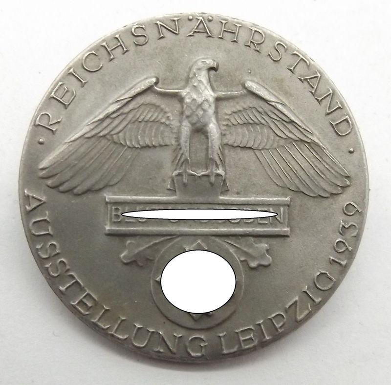 3. Reich: Abzeichen Reichsnährstand Ausstellung Leipzig 1939, Hersteller Otto Fechler Bernsbach/Erzgebirge. 3. Reich: Abzeichen Reichsnährstand Ausstellung Leipzig 1939, Hersteller Otto Fechler Bernsbach/Erzgebirge.