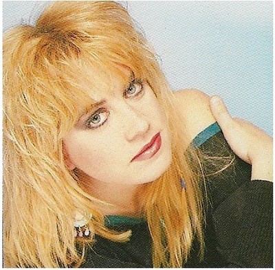 Bangles / Debbi Peterson - Light Blue Background #1 | Magazine Photo | 1986