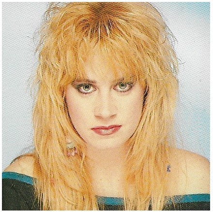 Bangles / Debbi Peterson - Light Blue Background #3 | Magazine Photo | 1986