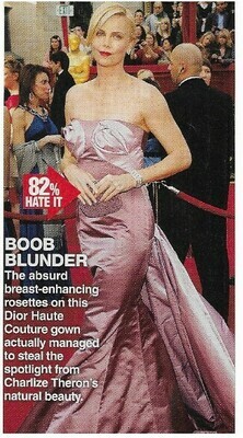 Theron, Charlize / Boob Blunder | Magazine Photo with Caption | March 2010