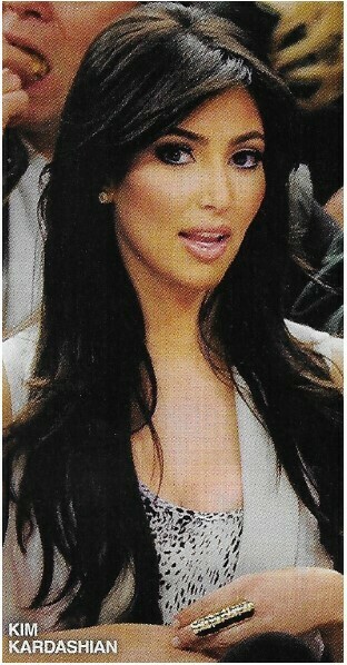 Kardashian, Kim / White Sleeveless Top, Gold Finger Ring | Magazine Photo | March 2010
