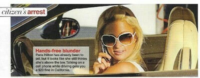 Hilton, Paris / Hands-Free Blunder | Magazine Photo with Caption | March 2010