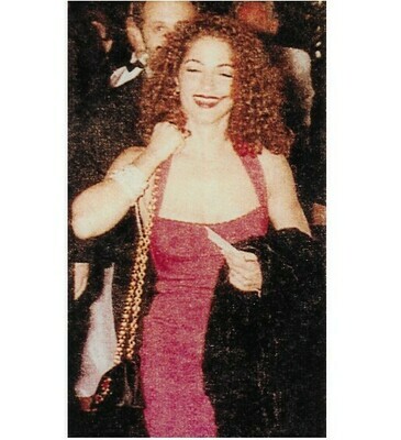 Estefan, Gloria / In Red Dress, Big Smile, Curly Hair, Coat Over Left Arm | Photo Print