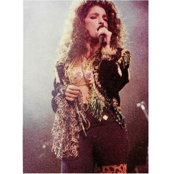 Estefan, Gloria / On Stage, Singing Into Mic., Leopard Print Leggings | Photo Print | 1989
