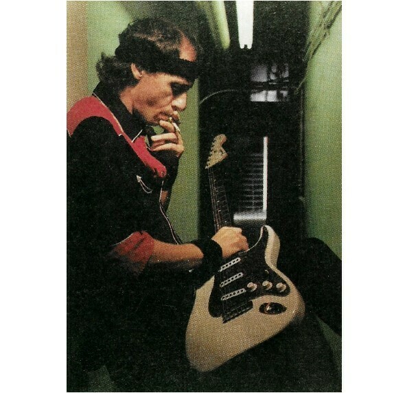 Dire Straits / Mark Backstage, Red-Black Shirt, Smoking Cigarette | Photo Print | 1985