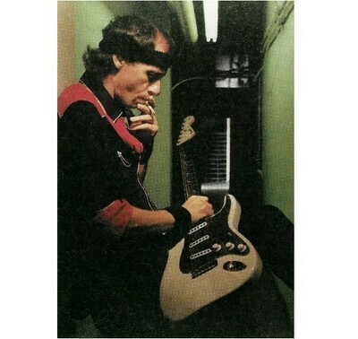 Dire Straits / Mark Backstage, Red-Black Shirt, Smoking Cigarette | Photo Print | 1985