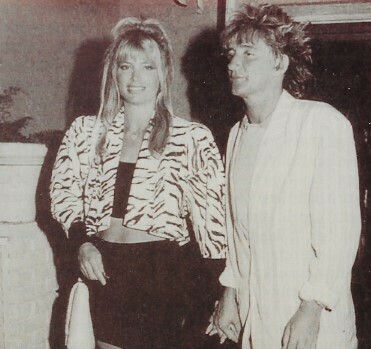 Stewart, Rod / With Kelly Emberg, Holding Hands, Indoors | Photo Print