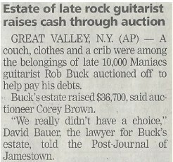10,000 Maniacs / Rob Buck - Estate of Late Rock Guitarist Raises Cash Through Auction | June 2001