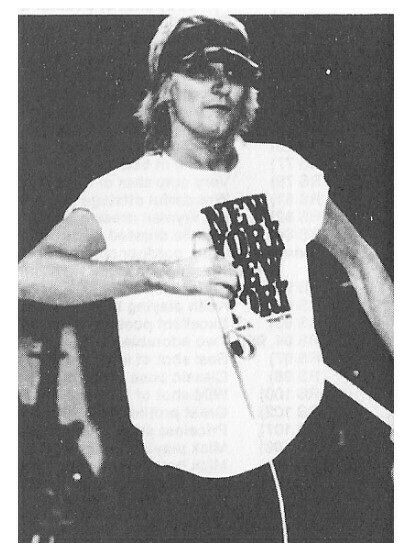 Stewart, Rod / On Stage Wearing New York New York Shirt and Visor | Magazine Photo | 1970s