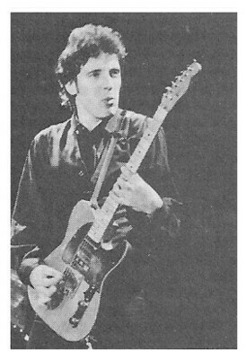 Springsteen, Bruce / On Stage, Playing Guitar, Looking to His Left | Magazine Photo | 1970s