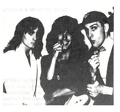 Cheap Trick / Robin Zander-Tom Petersson-Rick Nielson, Rick Giving a Thumbs Up | Magazine Photo | 1970s