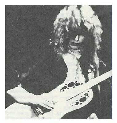 Heart / Nancy Wilson-On Stage-Looking Down-Playing Guitar / 1970s