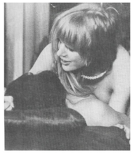 Faithfull, Marianne / On Couch with Friend-Wearing Necklace | Magazine Photo