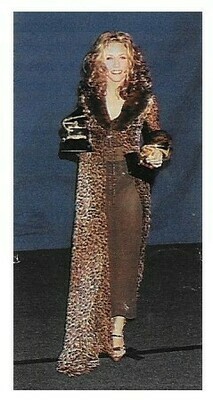 Crow, Sheryl / Grammy Awards-Holding 2 Awards | Magazine Photo | February 1997
