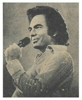 Diamond, Neil / On Stage-Holding Microphone | Magazine Photo | 1976