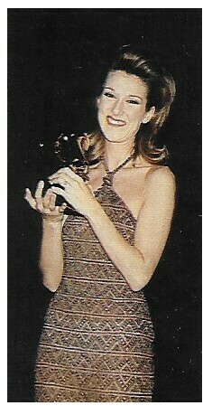 Dion, Celine / Holding Grammy Award-Smiling | Magazine Photo | February 1997