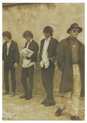 R.E.M. / Alongside Old Building-Bill With Newspaper | Magazine Photo | 1987