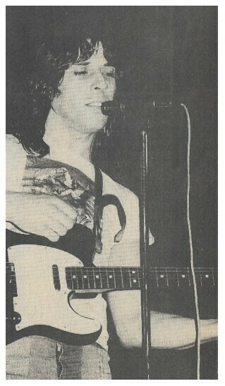 Cale, John / On Stage with Guitar | Magazine Photo